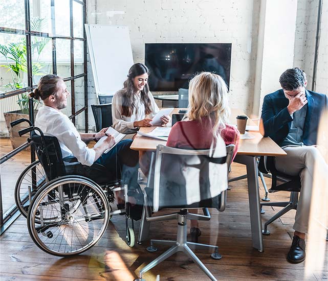 Kimberly Clark Employees Accommodating Individual with Disability